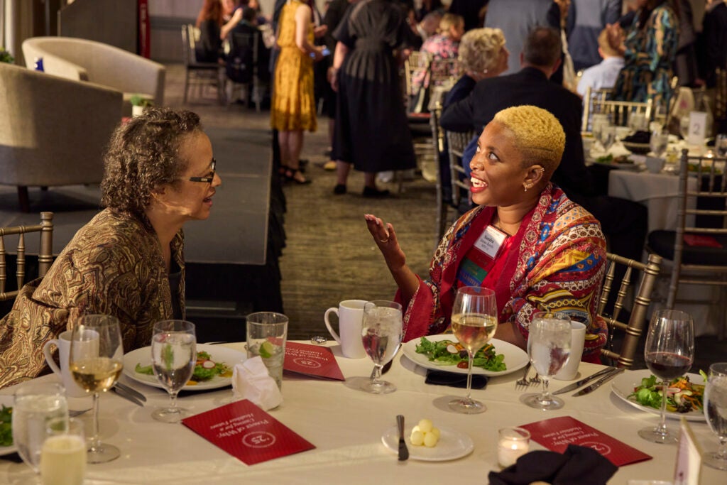 Former Alumni Association President Carmon Davis chats with a fellow alumna. 
