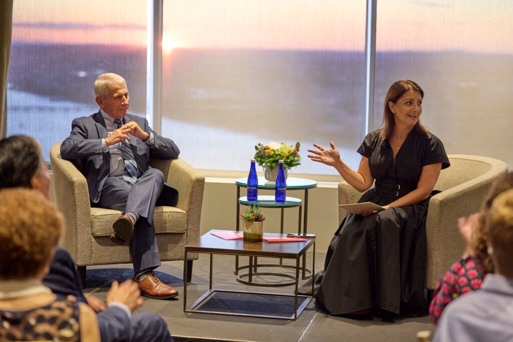 Anthony Fauci and Mandy Cohen speak at the awards dinner. 
