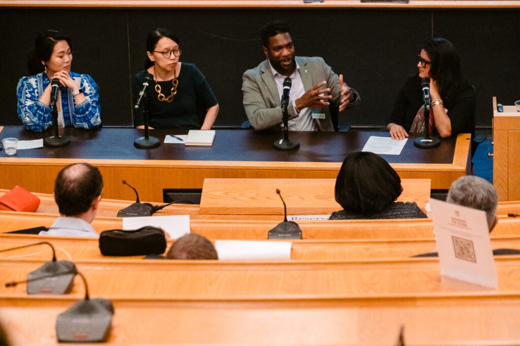 Stephanie Kang, Bryan O. Buckley, and Eirliani “Lin” Abdul Rahman, speak on a panel about navigating uncertainty moderated by Isha Nirola.