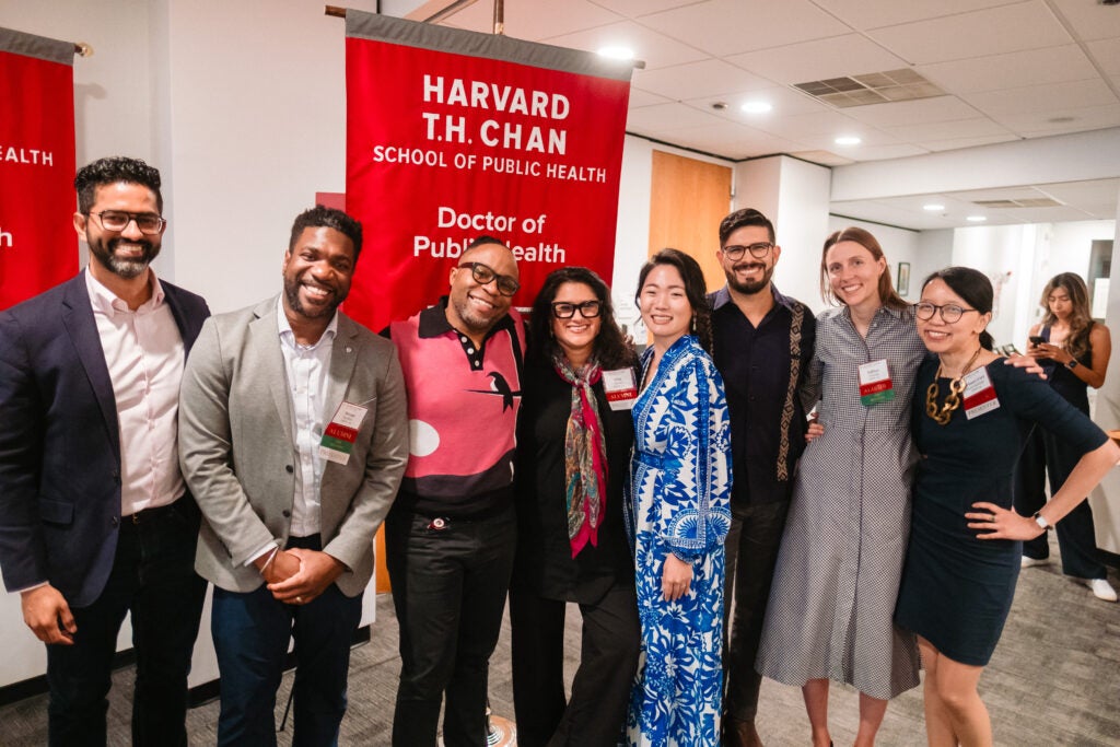 Speakers on the DrPH panel pose with friends. 