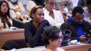 Audience members seated during the event