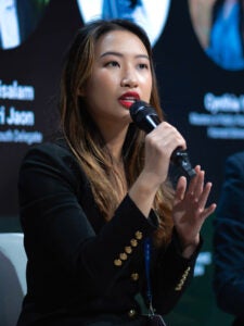 Cynthia Yue speaking at a conference