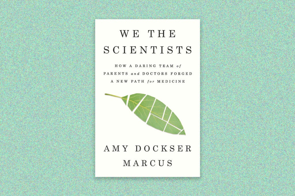 Book cover: "We the Scientists" by Am Dockser Marcus. The book cover has a green leaf divided by white lines, black type and a beige background. The composition is on a jade-speckled background.