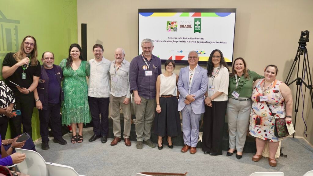 Marcia Castro poses with panelists and attendees at the Lancet Commission panel.