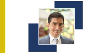 Headshot of Darius Lakdawalla in decorative banner