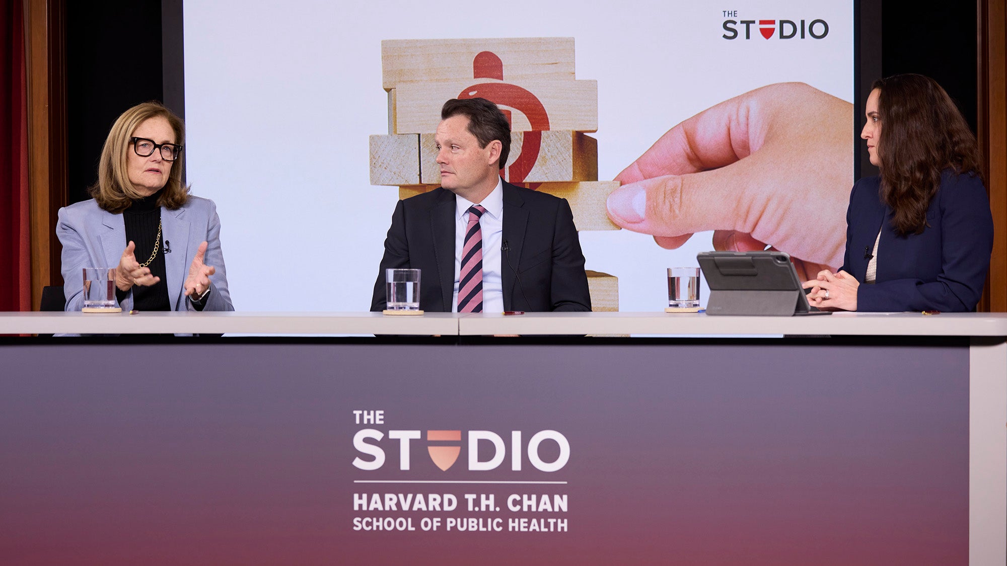 Panel on health care reform at The Studio, Dec. 1, 2025, featuring (from left) Kate Walsh, Justin Senior, and moderator Adrianna McIntyre. Photo by Kent Dayton.