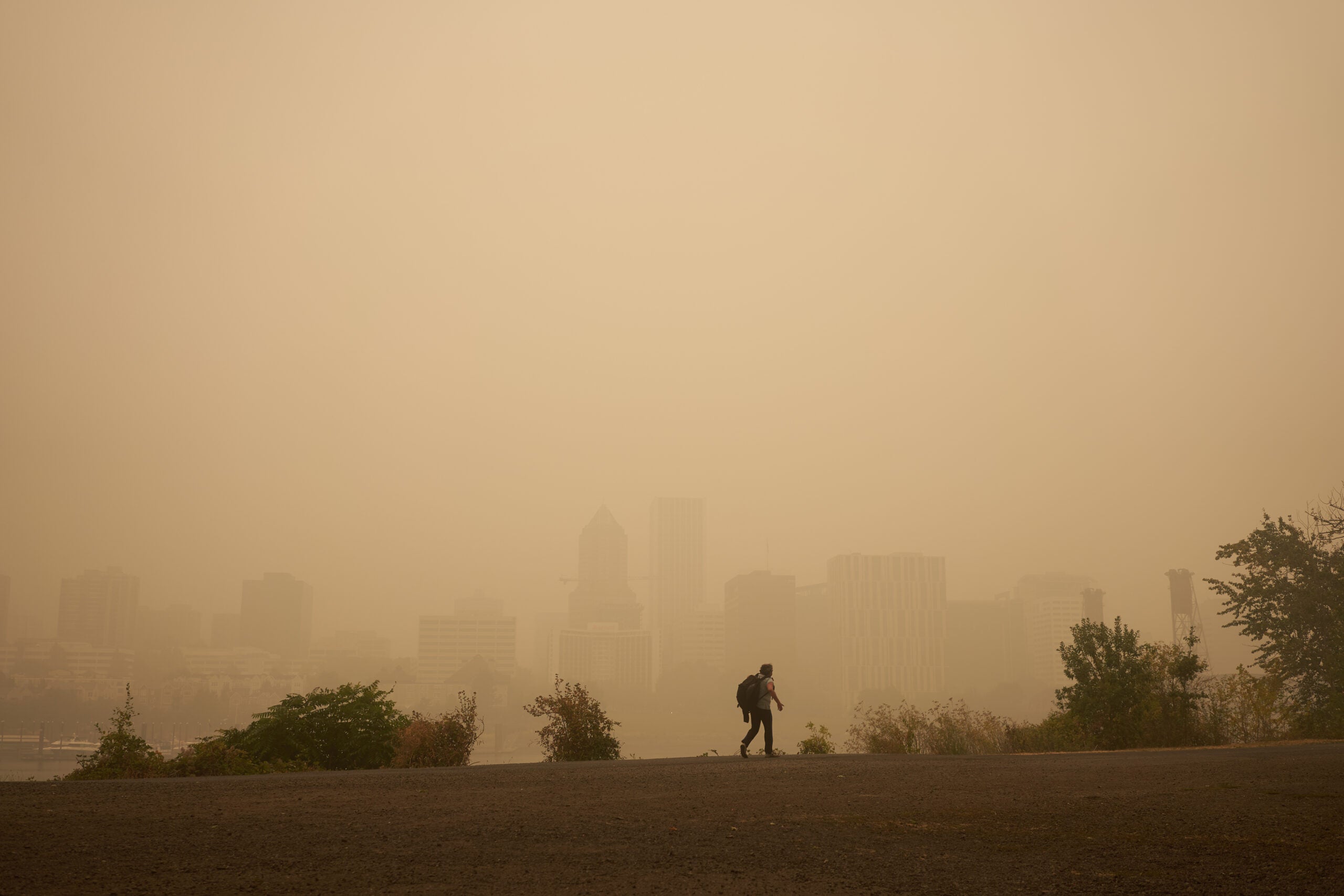 An orange smoke-filled sky in Portland during a wildfire