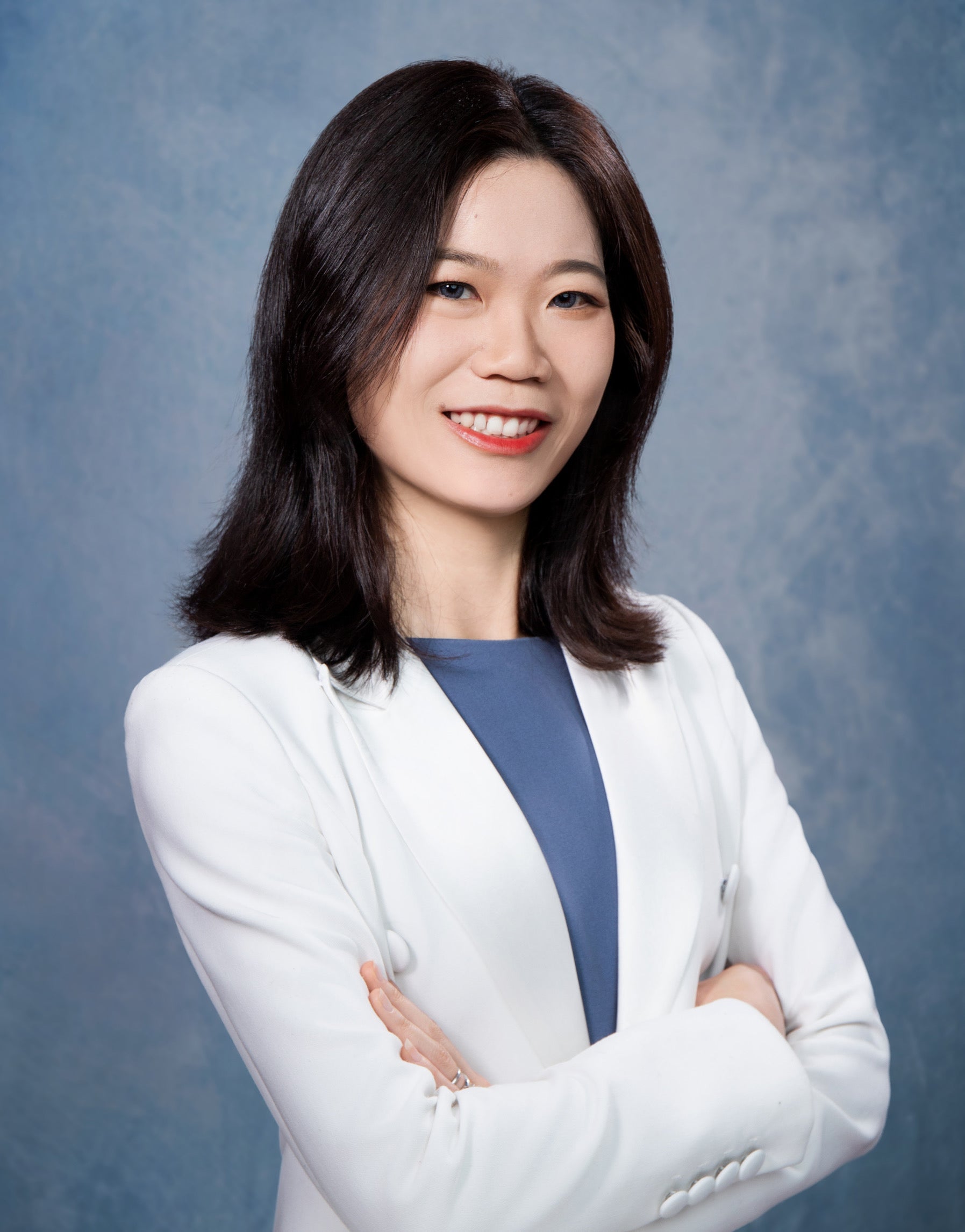 A headshot of Jun Jiang