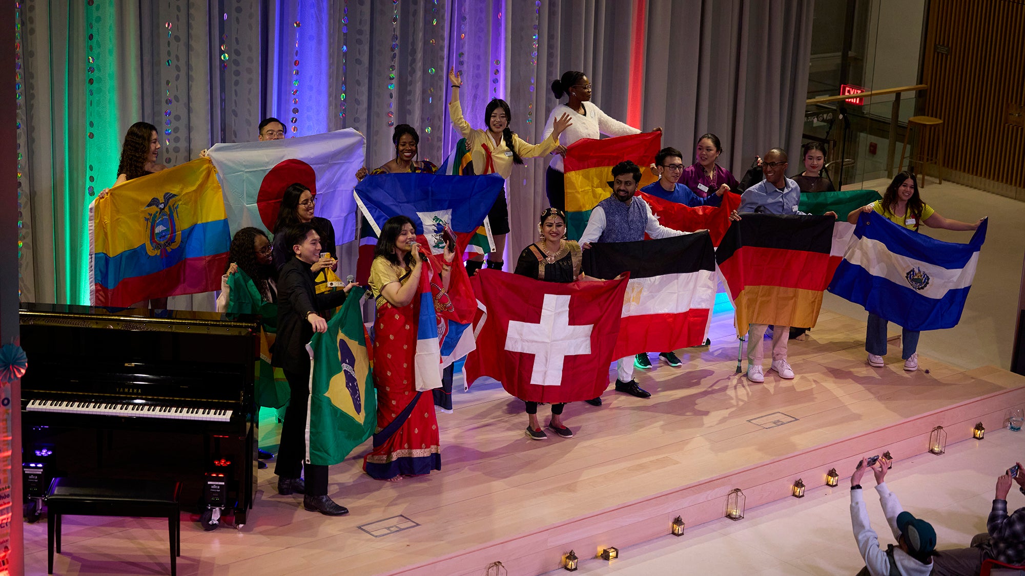 Performers with national flags at i-Night