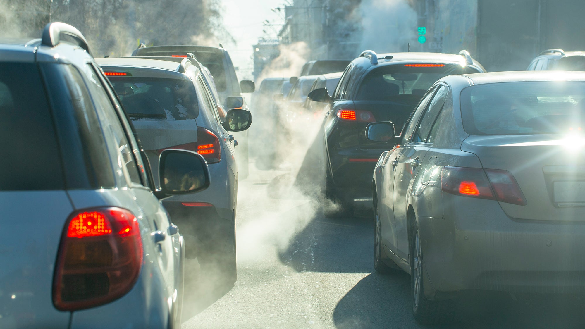 Pollution from the exhaust of cars in the city in the winter.