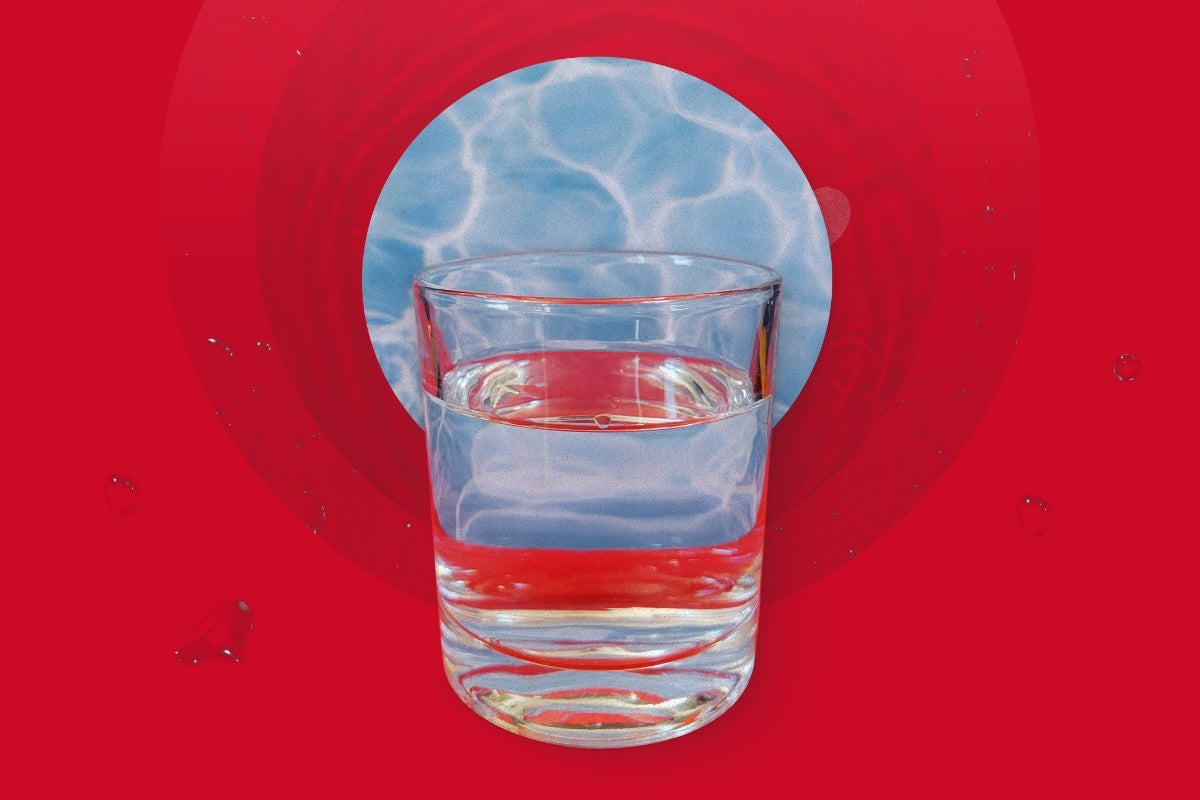 An illustration of a glass of water superimposed over a cancer cell against a red background.