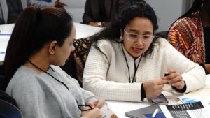 Attendees in discussion