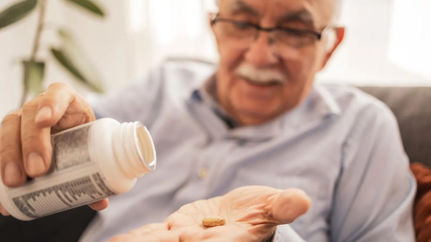 Man taking vitamin