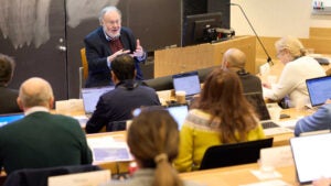 Instructor speaking in front of a class