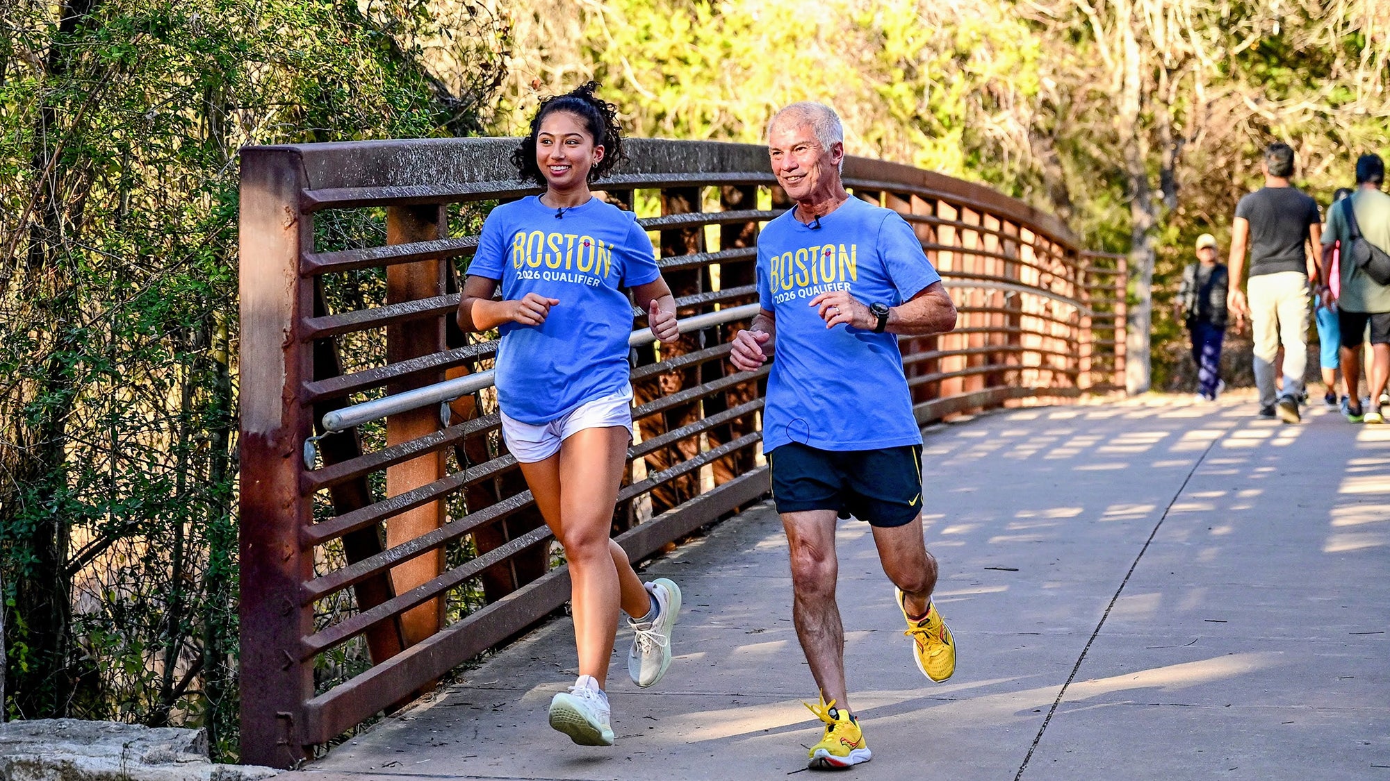 Mia Sanchez runs with her grandfather Carlos. Photo: Jackson Sanchez