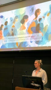 A woman speaking at a podium