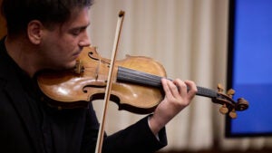 A man playing a violin