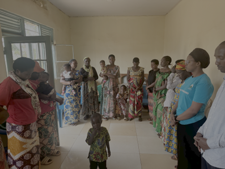 Participants in a community healing circle facilitated by a Community Healing Assistant (CHA)