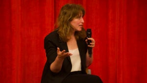 Amanda Yarnell speaking while holding microphone