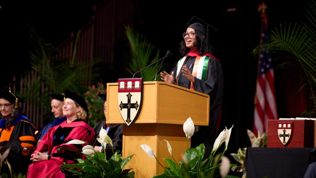 Rajeshwari Subramanian speaking at a podium