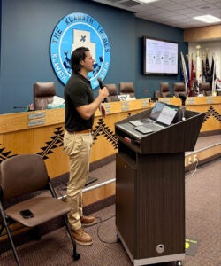 Jake Wheeler speaking at a podium