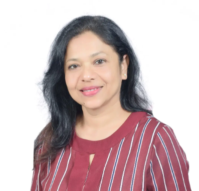 Anuradha Mascarenhas is pictured from the waist up wearing a red striped shirt