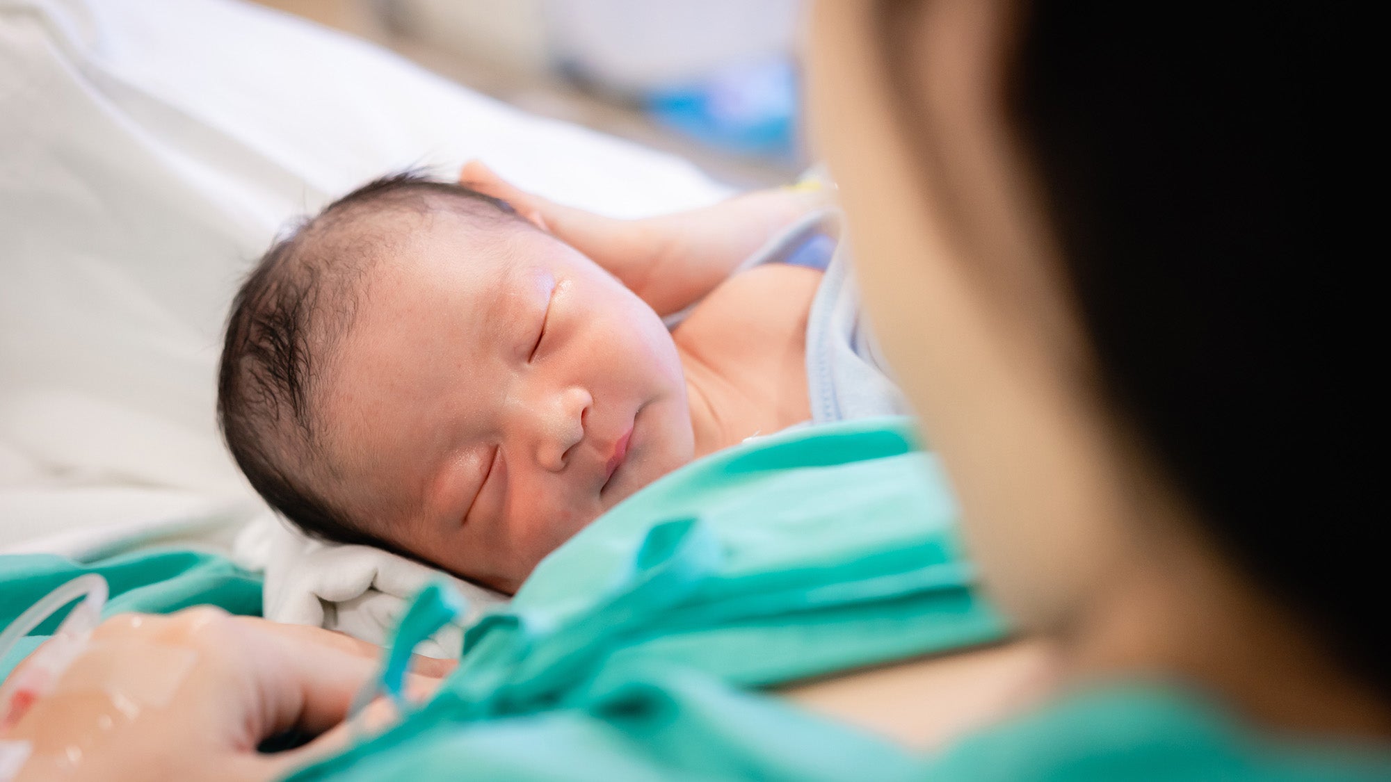 Mother holding newborn