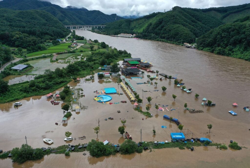 Muddy water floods a swimming area as a nearby river overflowed amid torrential rain, in Chuncheon in Seoul, Aug, 10, 2022.
Yonhap/EPA via Shutterstock