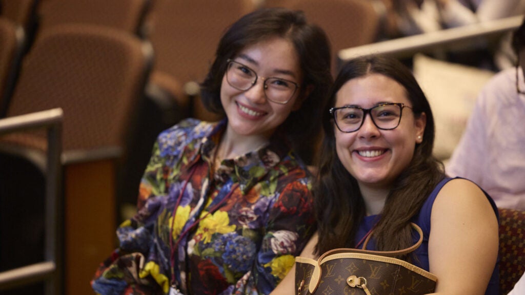 Two women smiling