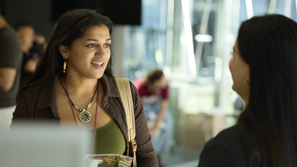 Two female students chatting