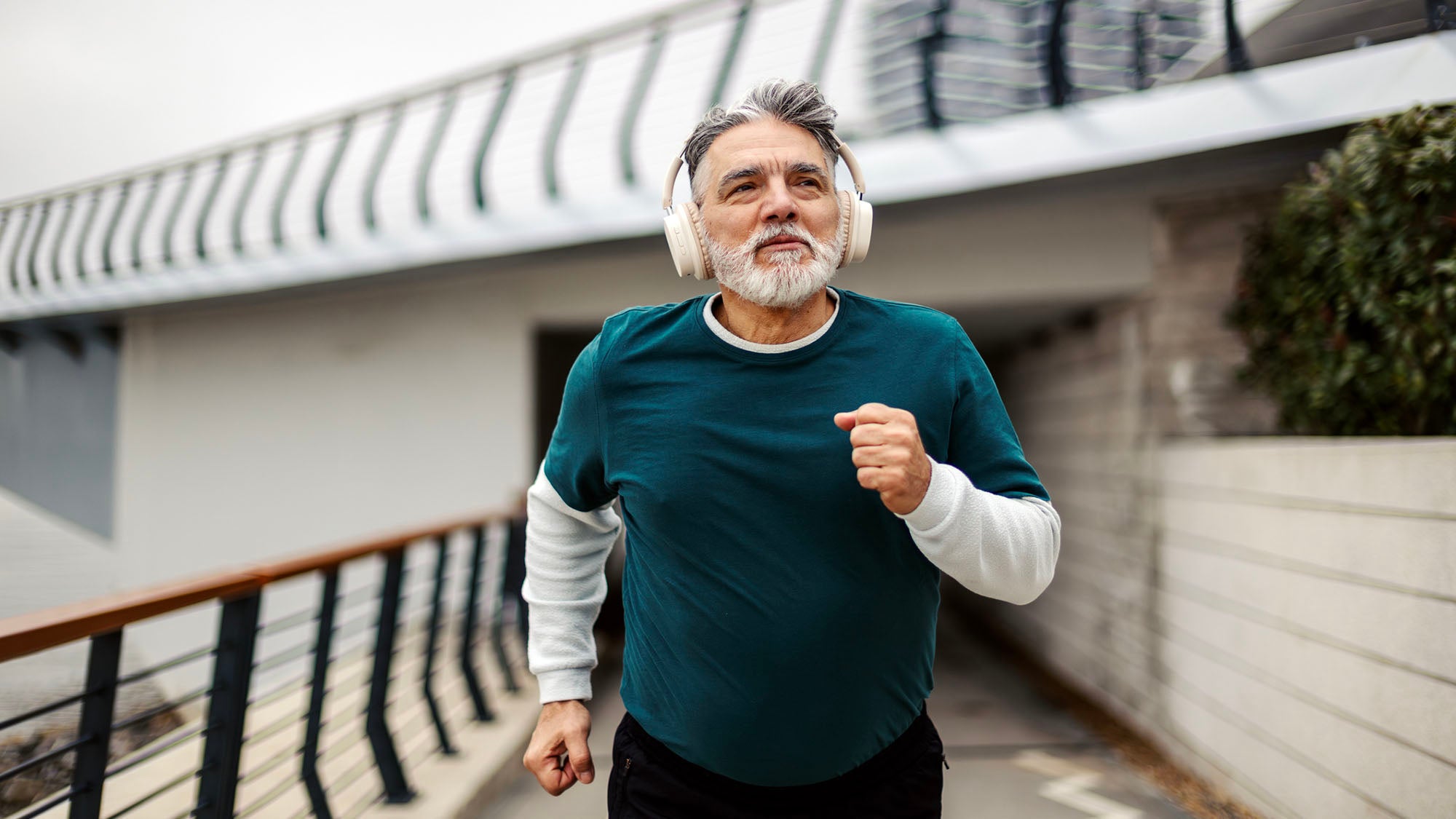 An older man jogging