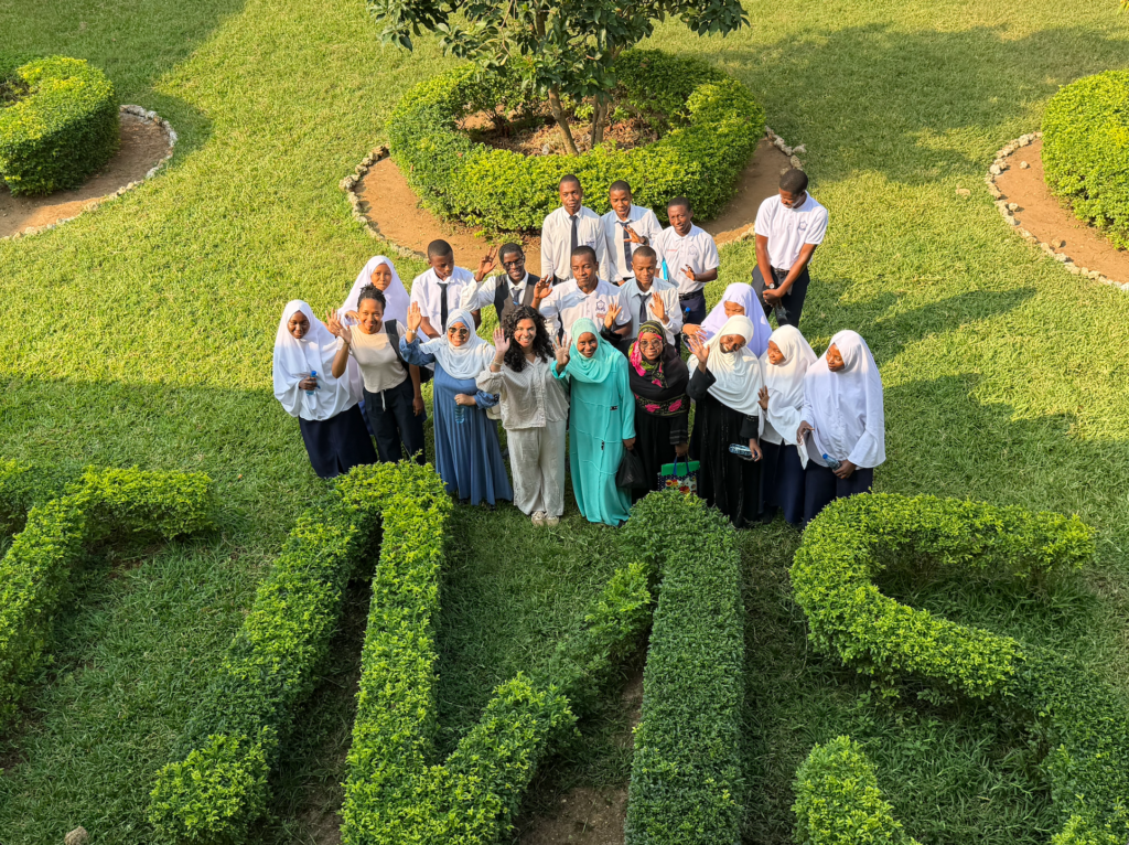Site visit with students from the environmental and creative club at Aboud Jumbe Mwinyi School, a group of young people who have spent years improving their campus and community through environmental action.