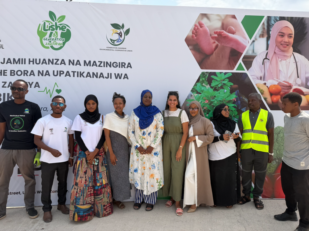 Harvard student team Emmanuella Michel and Farwa Akbari with the GZECU team that we worked with at a new program launch.