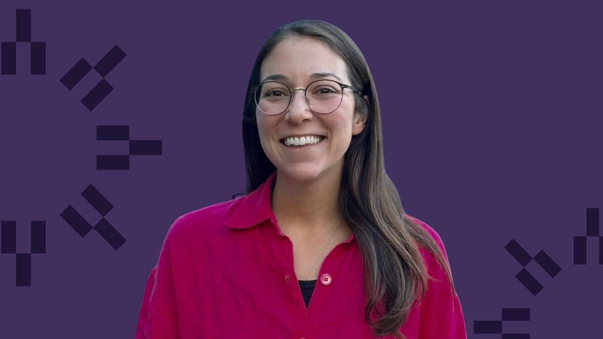 Tangoren headshot with purple graphic background.