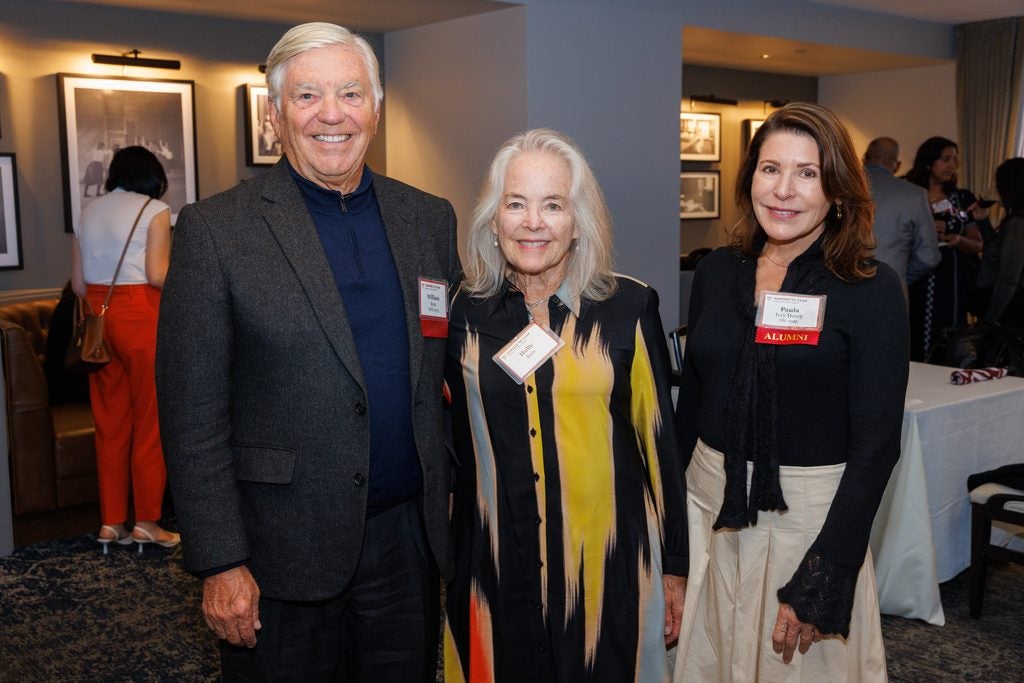 Paula Ivey Henry poses with William and Henry Rom. 