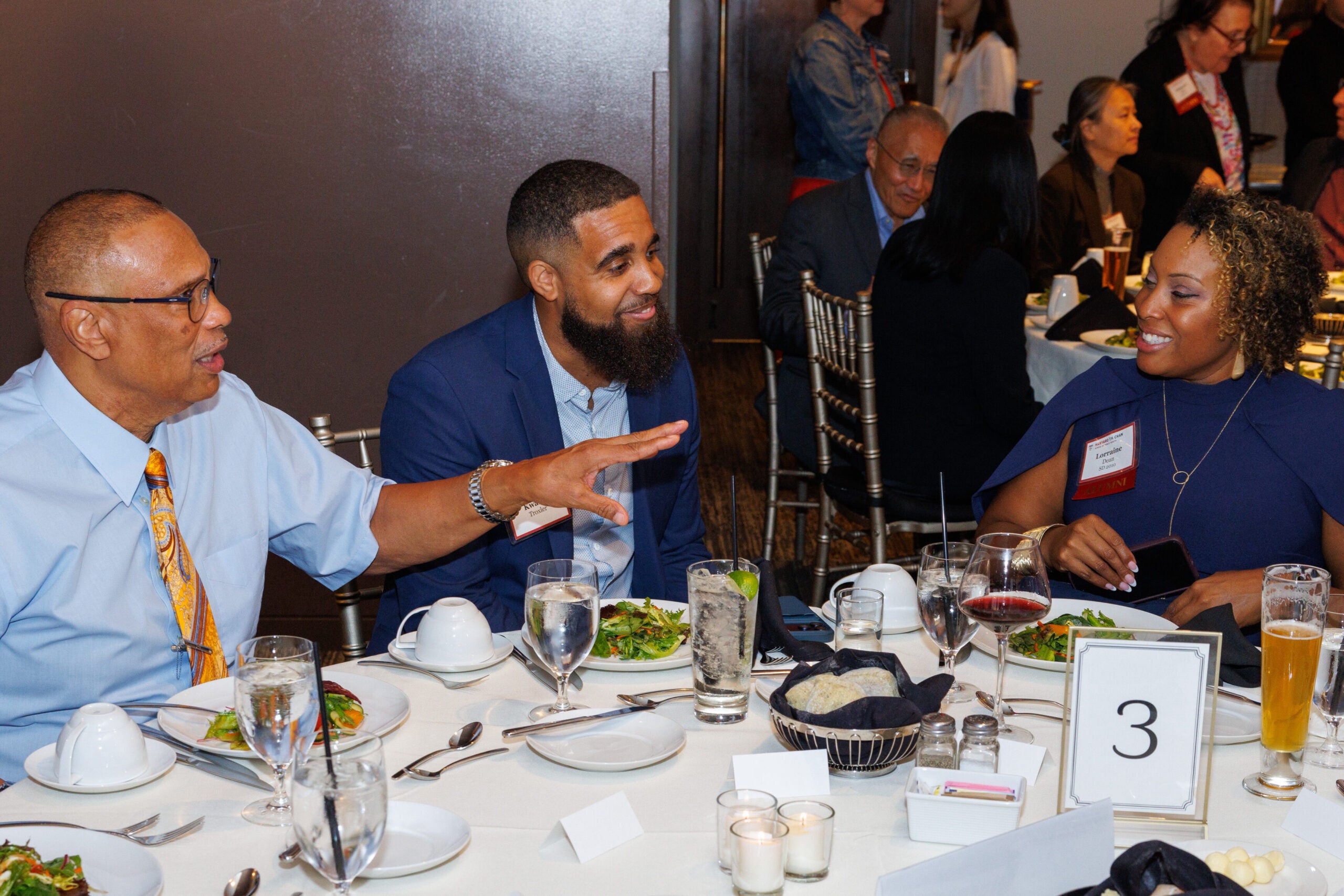 Spirited conversation at table three. 