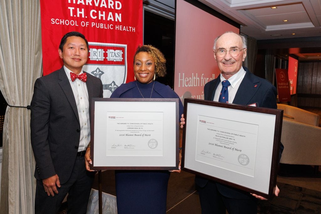 Alumni Council President Bernie Lee poses with Alumni Award of Merit recipients Lorraine Dean and Felix Gutzweiler. 