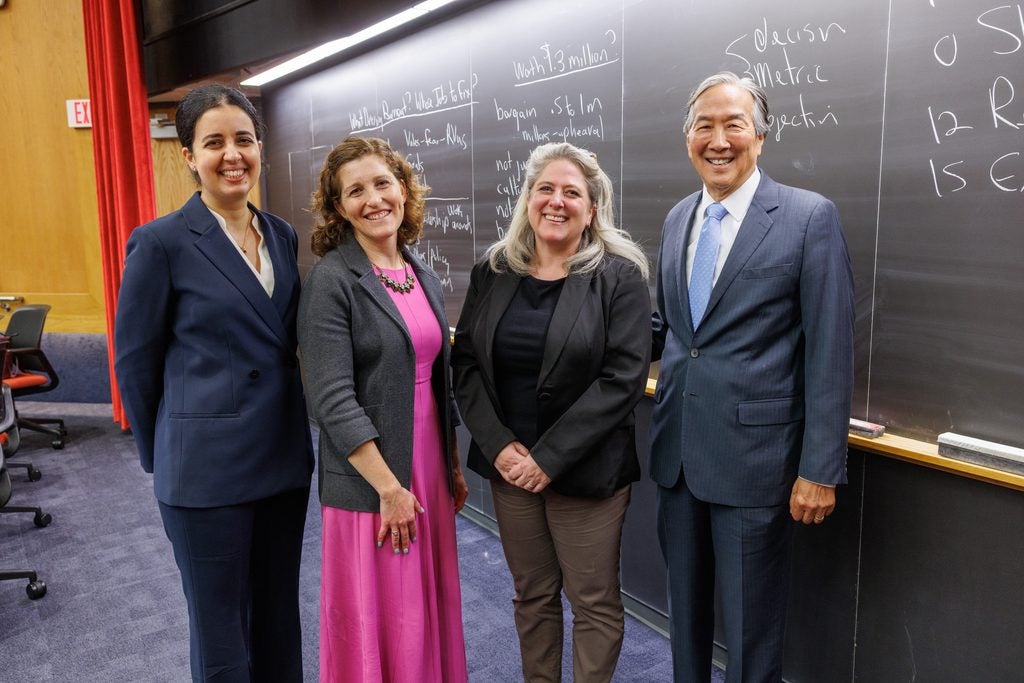 Panelists Mahrokh Irani, Morissa Henn, and Amy Rosenthal pose with moderator Howard Koh. 