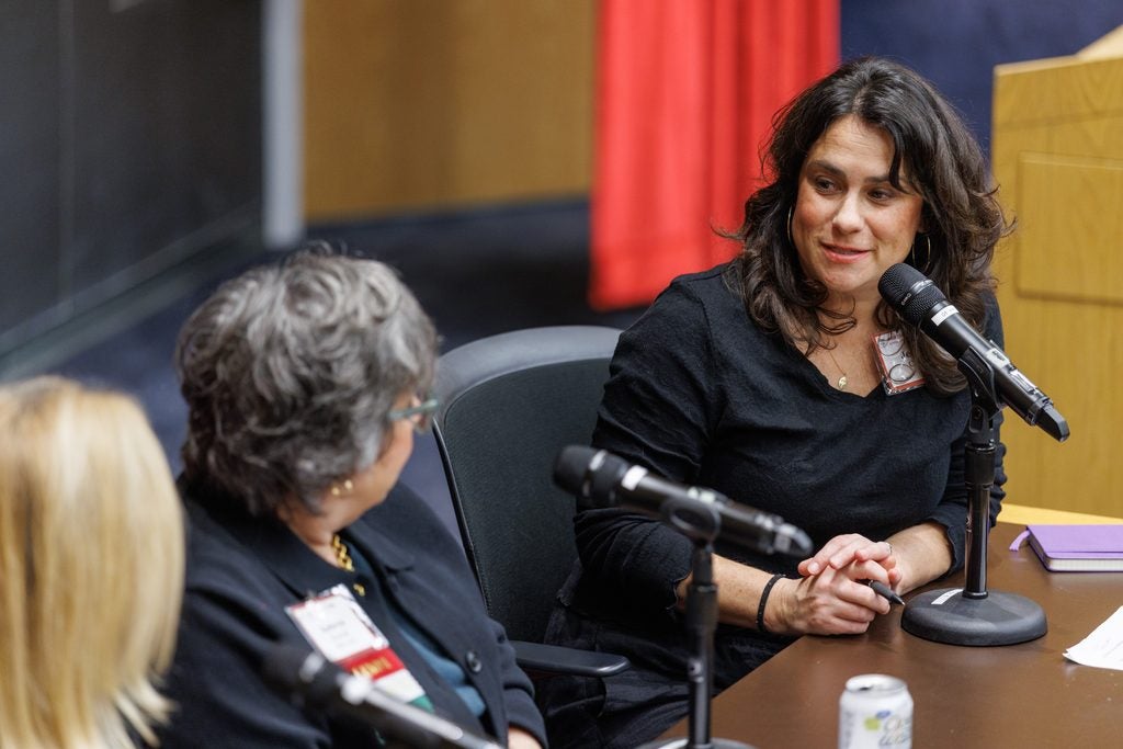 Elizabeth Rexrode looks on as Jessica Cohen speaks during the women's health panel. 