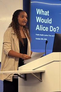 Hiwot Zewdie speaking at podium
